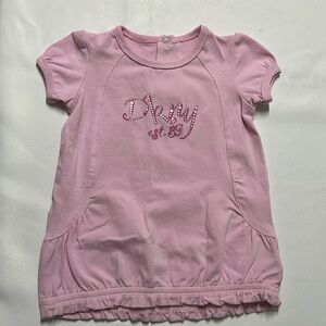 DKNY 0/3 months pink shirt.  Like new.  No wear and tear.